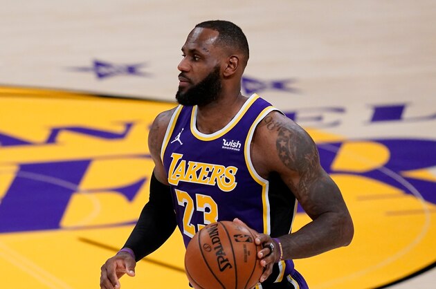 Los Angeles Lakers forward LeBron James (23) takes the ball down the court during the second half of an NBA basketball game against the Chicago Bulls Friday, Jan. 8, 2021, in Los Angeles. (AP Photo/Ashley Landis)