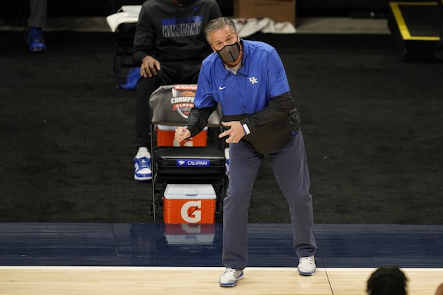 Kentucky head coach John Calipari in action during the first half of an NCAA college basketball game against Kansas, Tuesday, Dec. 1, 2020, in Indianapolis. (AP Photo/Darron Cummings)