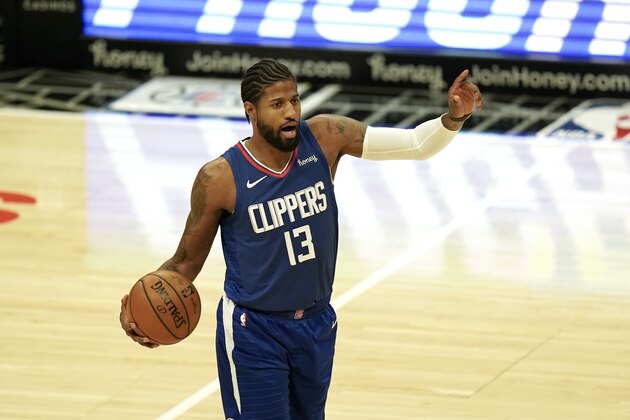 Los Angeles Clippers' Paul George gestures during the first half of an NBA basketball game against the Portland Trail Blazers Wednesday, Dec. 30, 2020, in Los Angeles. (AP Photo/Jae C. Hong)