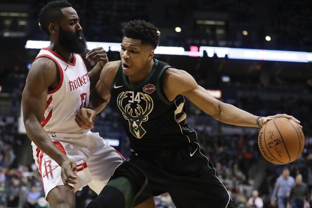 Milwaukee Bucks' Giannis Antetokounmpo tries to drive past Houston Rockets' James Harden during the second half of an NBA basketball game Wednesday, March 7, 2018, in Milwaukee. (AP Photo/Morry Gash)