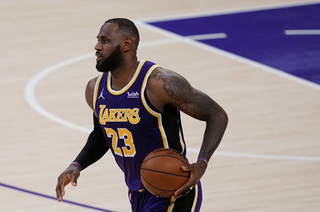 Los Angeles Lakers forward LeBron James (23) takes the ball down the court during the second half of an NBA basketball game against the Chicago Bulls Friday, Jan. 8, 2021, in Los Angeles. (AP Photo/Ashley Landis)