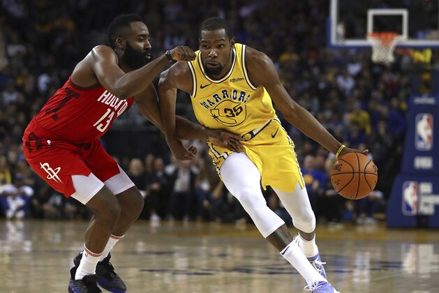 Houston Rockets' James Harden, left, guards Golden State Warriors' Kevin Durant during the second half of an NBA basketball game Thursday, Jan. 3, 2019, in Oakland, Calif. (AP Photo/Ben Margot)