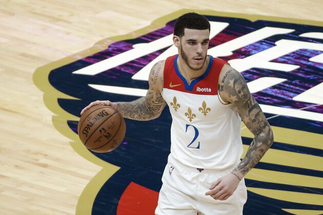 New Orleans Pelicans guard Lonzo Ball (2) against the Charlotte Hornets in the second half of an NBA basketball game in New Orleans, Friday, Jan. 8, 2021. (AP Photo/Derick Hingle)