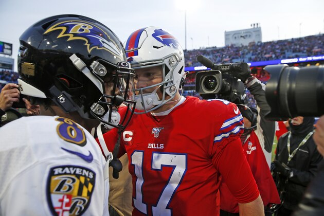 Buffalo Bills quarterback Josh Allen (17) talks with Baltimore Ravens quarterback Lamar Jackson (8) following a 24-17 Ravens win in an NFL football game in Orchard Park, N.Y., Sunday, Dec. 8, 2019. (AP Photo/John Munson)