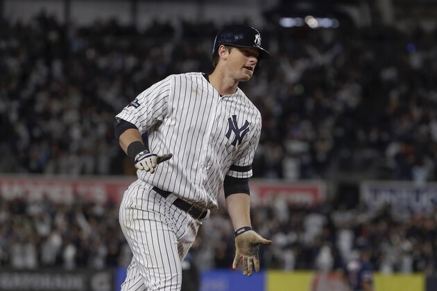 New York Yankees' DJ LeMahieu rounds the bases after hitting a solo home run against the Minnesota Twins during the sixth inning of Game 1 of an American League Division Series baseball game, Friday, Oct. 4, 2019, in New York. (AP Photo/Frank Franklin II)