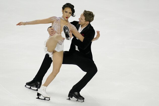 Madison Chock and Evan Bates perform during the rhythm dance program at the U.S. Figure Skating Championships, Friday, Jan. 15, 2021, in Las Vegas. (AP Photo/John Locher)