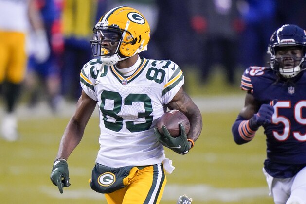Green Bay Packers' Marquez Valdes-Scantling races to the end zone for a 72-yard touchdown reception during the first half of an NFL football game against the Chicago Bears Sunday, Jan. 3, 2021, in Chicago. (AP Photo/Nam Y. Huh)