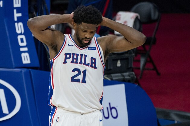 Philadelphia 76ers center Joel Embiid reacts during the first half of an NBA basketball game against the Washington Wizards, Wednesday, Jan. 6, 2021, in Philadelphia. The 76ers won 141-136. (AP Photo/Chris Szagola)