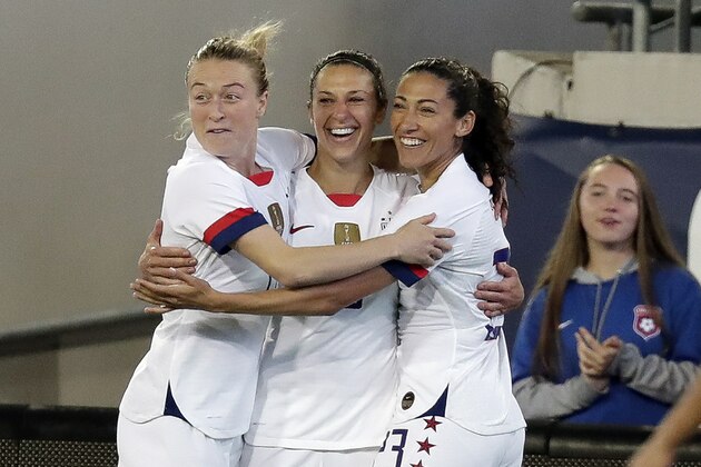 U.S. forward Carli Lloyd, center, celebrates her goal against the Costa Rica with Emily Sonnett, left, and Christen Press during the first half of an international friendly soccer match Sunday, Nov. 10, 2019, in Jacksonville, Fla. (AP Photo/John Raoux)