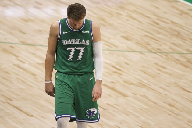 Dallas Mavericks guard Luka Doncic (77) walks off the court during a game against the Chicago Bulls following the first half of an NBA basketball game, Sunday, Jan. 17, 2021, in Dallas. The Bulls won 117-101. (AP Photo/Ron Jenkins)