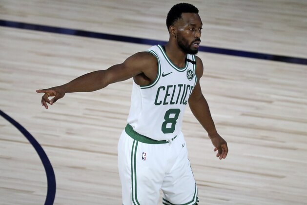 Boston Celtics guard Kemba Walker (8) gestures during the second half of Game 3 of an NBA basketball first-round playoff series against the Philadelphia 76ers, Friday, Aug. 21, 2020, in Lake Buena Vista, Fla. (Kim Klement/Pool Photo via AP)