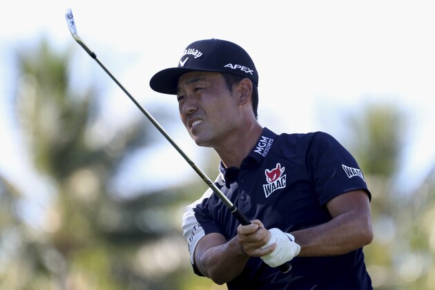 CORRECTS TO KEVIN NA NOT KEITH MITCHELL - Kevin Na follows his drive on the 11th tee box during the third round at the Sony Open golf tournament Saturday, Jan. 16, 2021, in Honolulu. (AP Photo/Marco Garcia)