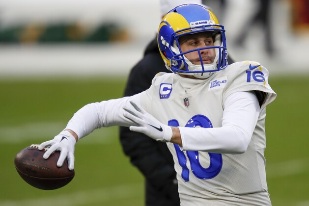 Los Angeles Rams quarterback Jared Goff warms up before an NFL divisional playoff football game against the Green Bay Packers, Saturday, Jan. 16, 2021, in Green Bay, Wis. (AP Photo/Matt Ludtke)