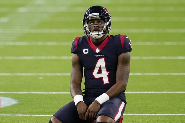 Houston Texans quarterback Deshaun Watson (4) kneels / sits on the field in frustration during an NFL football game against the Tennessee Titans, Sunday, Jan. 3, 2021, in Houston. (AP Photo/Matt Patterson)