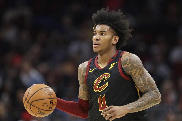Cleveland Cavaliers' Kevin Porter Jr. drives against the Philadelphia 76ers in the first half of an NBA basketball game, Wednesday, Feb. 26, 2020, in Cleveland. (AP Photo/Tony Dejak)