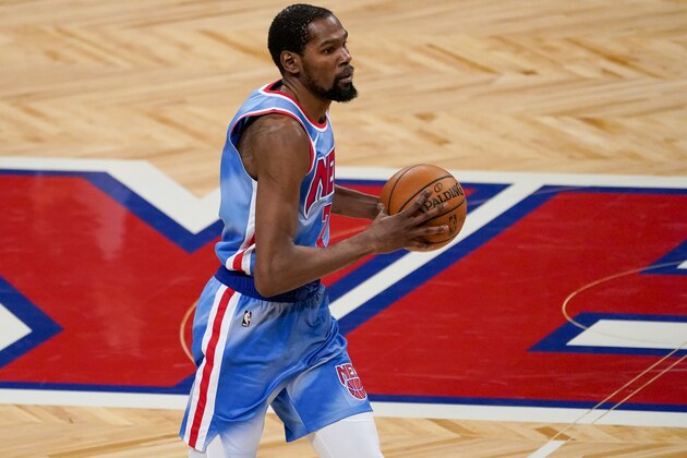 Brooklyn Nets forward Kevin Durant handles the ball during the first half of an NBA basketball game against the Orlando Magic, Saturday, Jan. 16, 2021, in New York. (AP Photo/Mary Altaffer)