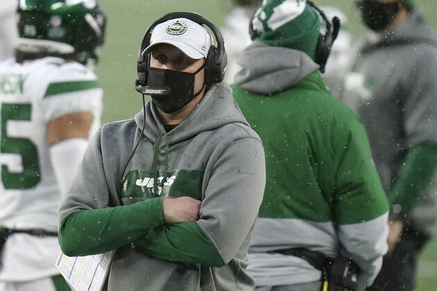 New York Jets head coach Adam Gase watches from the sideline in the second half of an NFL football game against the New England Patriots, Sunday, Jan. 3, 2021, in Foxborough, Mass. (AP Photo/Charles Krupa)
