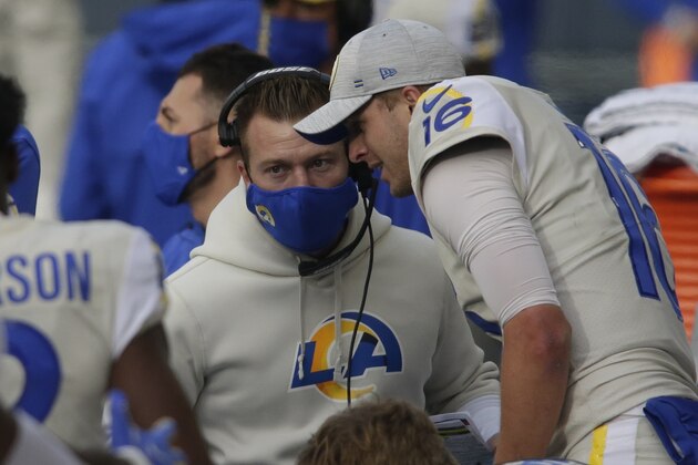 Los Angeles Rams quarterback Jared Goff (16) talks with head coach Sean McVay on the sideline during the first half of an NFL football game against the Seattle Seahawks, Sunday, Dec. 27, 2020, in Seattle. (AP Photo/Scott Eklund)