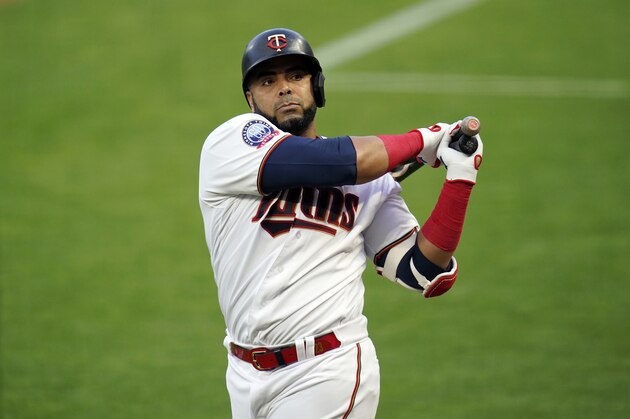 Minnesota Twins designated hitter Nelson Cruz (23)} waits to bat against the Chicago White Sox in a baseball game Monday, Aug. 31 2020, in Minneapolis. (AP Photo/Jim Mone)