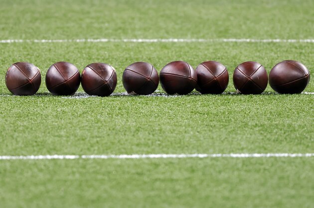 Footballs are seen on the field before an NFL wild-card playoff football game between the New Orleans Saints and the Chicago Bears, Sunday, Jan. 10, 2021, in New Orleans. The Saints defeated the Bears 21-9. (AP Photo/Tyler Kaufman)