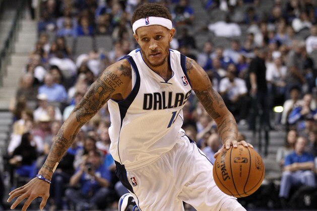 Dallas Mavericks guard Delonte West (13) controls the ball against the Phoenix Suns in an NBA basketball game Wednesday, Oct. 17, 2012, in Dallas. The Suns defeated the Mavericks 100-94. (AP Photo/Tony Gutierrez)