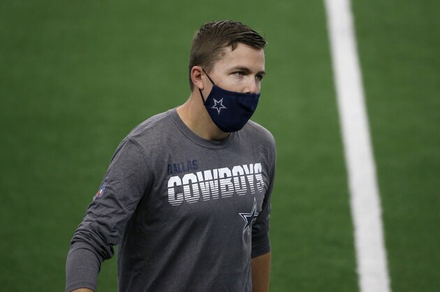 Dallas Cowboys offensive coordinator Kellen Moore stands of the field before an NFL football game against the New York Giants in Arlington, Texas, Sunday, Oct. 11, 2020.(AP Photo/Michael Ainsworth)