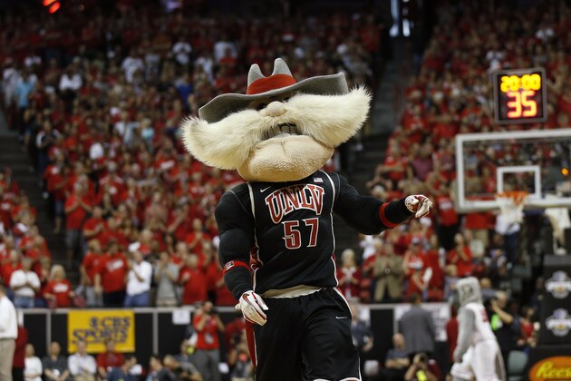 UNLV's mascot Hey Reb warms up the crowd before the start of the Mountain West Conference tournament championship NCAA college basketball game on Saturday, March 16, 2013, in Las Vegas. (AP Photo/Isaac Brekken)