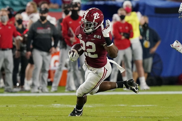 Alabama running back Najee Harris runs against Ohio State during the first half of an NCAA College Football Playoff national championship game, Monday, Jan. 11, 2021, in Miami Gardens, Fla. (AP Photo/Lynne Sladky)