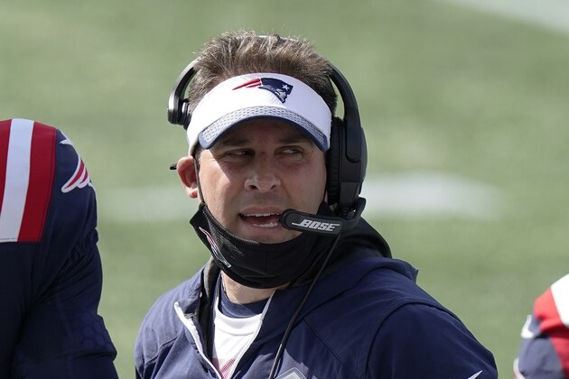 New England Patriots offensive coordinator Josh McDaniels works along the sideline in the first half of an NFL football game against the Miami Dolphins, Sunday, Sept. 13, 2020, in Foxborough, Mass. (AP Photo/Steven Senne)