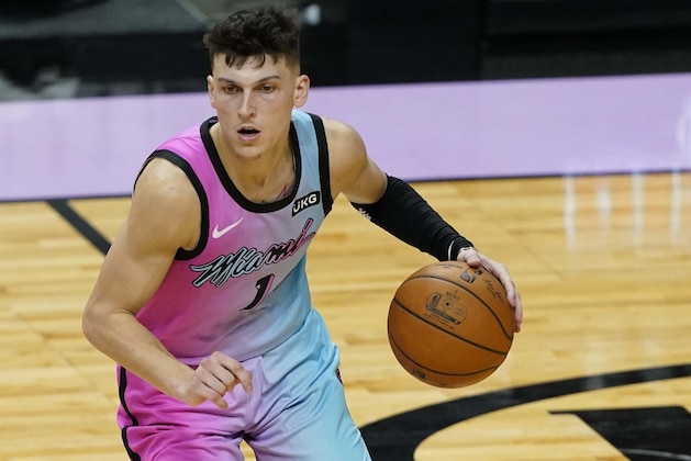 Miami Heat guard Tyler Herro (14) looks to pass the basketball during the second half of an NBA basketball game against the Oklahoma City Thunder, Monday, Jan. 4, 2021, in Miami. (AP Photo/Marta Lavandier)