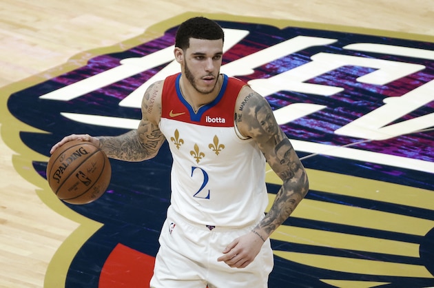 New Orleans Pelicans guard Lonzo Ball (2) against the Charlotte Hornets in the second half of an NBA basketball game in New Orleans, Friday, Jan. 8, 2021. (AP Photo/Derick Hingle)