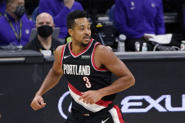 Portland Trail Blazers guard CJ McCollum runs to the other end of the court after scoring against the Sacramento Kings during the second half of an NBA basketball game in Sacramento, Calif., Saturday, Jan. 9, 2021. The Trail Blazers won 125-99. (AP Photo/Rich Pedroncelli) Portland Trail Blazers guard CJ McCollum runs to the other end of the court after scoring against the Sacramento Kings during the second half of an NBA basketball game in Sacramento, Calif., Saturday, Jan. 9, 2021. The Trail Blazers won 125-99. (AP Photo/Rich Pedroncelli)