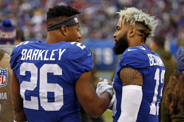 New York Giants running back Saquon Barkley (26) and Giants wide receiver Odell Beckham (13) on the sidelines against the Tampa Bay Buccaneers during an NFL football game Sunday, Nov. 18, 2018, in East Rutherford, N.J. (AP Photo/Adam Hunger)