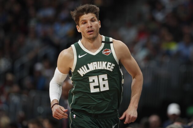 Milwaukee Bucks guard Kyle Korver (26) in the second half of an NBA basketball game Monday, March 9, 2020, in Denver. The Nuggets won 109-95. (AP Photo/David Zalubowski)