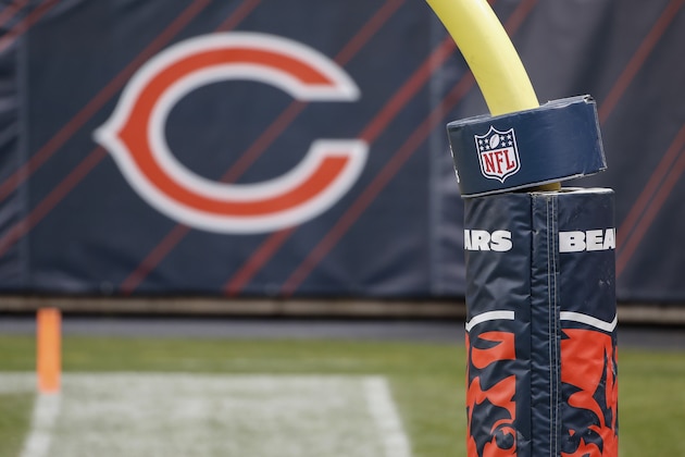 A Chicago Bears banner with logo is wrapped around the goal post before an NFL football game between the Chicago Bears and Houston Texans, Sunday, Dec. 13, 2020, in Chicago. (AP Photo/Kamil Krzaczynski)