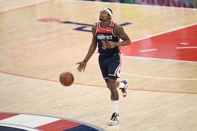 Washington Wizards guard Bradley Beal (3) dribbles the ball during the second half of an NBA basketball game against the Phoenix Suns, Monday, Jan. 11, 2021, in Washington. (AP Photo/Nick Wass)