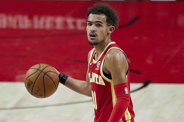 Atlanta Hawks guard Trae Young dribbles during the first half of an NBA basketball game against the Portland Trail Blazers in Portland, Ore., Saturday, Jan. 16, 2021. (AP Photo/Craig Mitchelldyer)