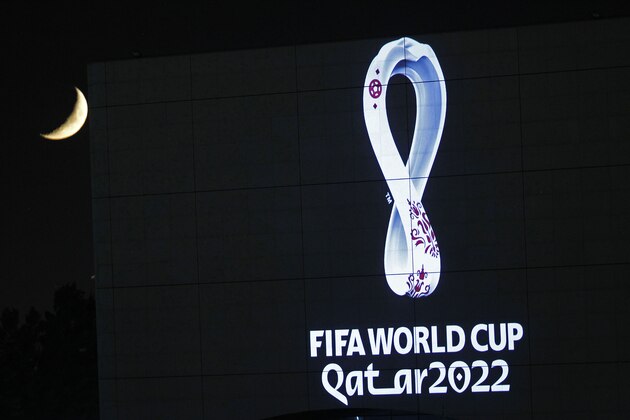 The 2022 Qatar World Cup logo is projected on the opera house of Algiers, Tuesday Sept.3, 2019. Flashed on big screens and projected onto landmarks worldwide, the 2022 Qatar World Cup logo was revealed Tuesday with a design that reflects both the tournament's compact infrastructure and winter schedule. (AP Photo/Toufik Doudou)