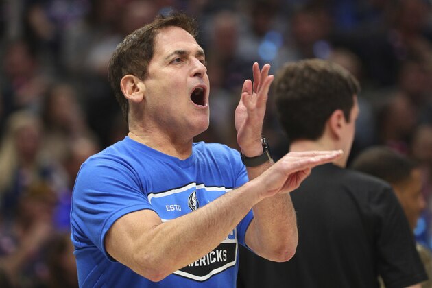 Dallas Mavericks owner Mark Cuban yells at an official in an NBA basketball game against the Sacramento Kings Sunday, Dec. 8, 2019, in Dallas. (AP Photo/Richard W. Rodriguez)
