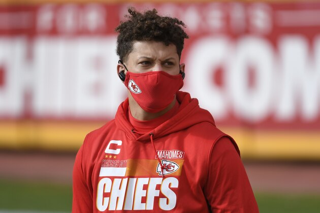 Kansas City Chiefs quarterback Patrick Mahomes walks on the field before an NFL divisional round football game against the Cleveland Browns, Sunday, Jan. 17, 2021, in Kansas City. (AP Photo/Reed Hoffmann)