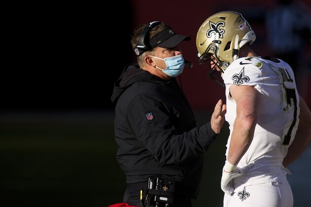 New Orleans Saints head coach Sean Payton talks with New Orleans Saints quarterback Taysom Hill (7) against the Denver Broncos during the first half of an NFL football game, Sunday, Nov.. 29, 2020, in Denver. (AP Photo/Justin Edmonds)