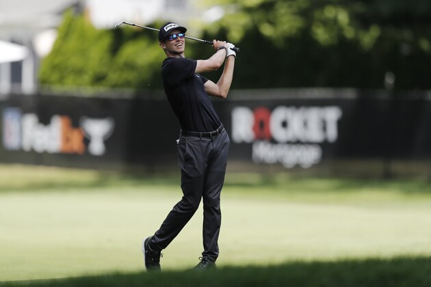 Brandon Hagy hits his approach shot on the eighth hole during the second round of the Rocket Mortgage Classic golf tournament, Friday, July 3, 2020, at the Detroit Golf Club in Detroit. (AP Photo/Carlos Osorio)