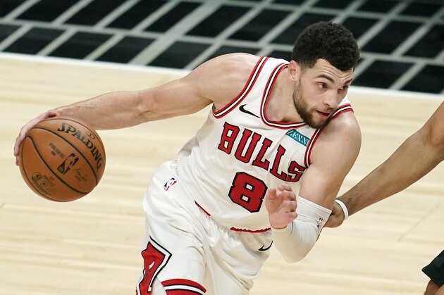 Chicago Bulls guard Zach LaVine dribbles against the Los Angeles Clippers during an NBA basketball game Sunday, Jan. 10, 2021, in Los Angeles. (AP Photo/Marcio Jose Sanchez)