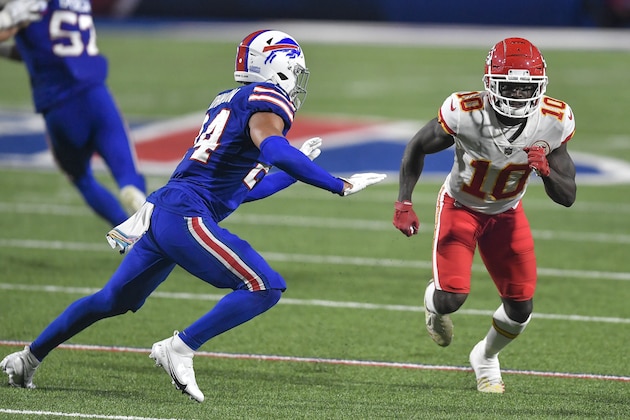 Kansas City Chiefs wide receiver Tyreek Hill, right, is defended by Buffalo Bills cornerback Taron Johnson during the second half of an NFL football game, Monday, Oct. 19, 2020, in Orchard Park, N.Y. (AP Photo/Adrian Kraus)