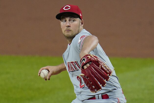 FILE - In this Friday, Sept. 4, 2020 file photo, Cincinnati Reds starting pitcher Trevor Bauer delivers during the fourth inning of the second baseball game of a double header against the Pittsburgh Pirates in Pittsburgh. Trevor Bauer's agent says the pitcher is rejecting the Cincinnati Reds' $18.9 million qualifying offer. The right-hander, who turns 30 in January, was given the offer on Sunday, Nov. 1, 2020 and had until Nov. 11 to make his decision. (AP Photo/Gene J. Puskar, File)