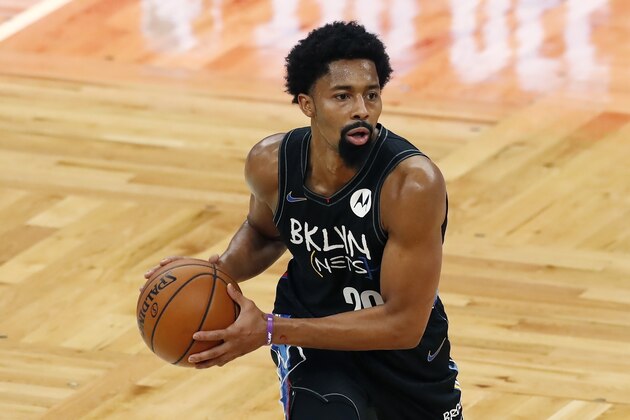 Brooklyn Nets' Spencer Dinwiddie plays against the Boston Celtics during the first half of an NBA basketball game, Friday, Dec. 25, 2020, in Boston. (AP Photo/Michael Dwyer)