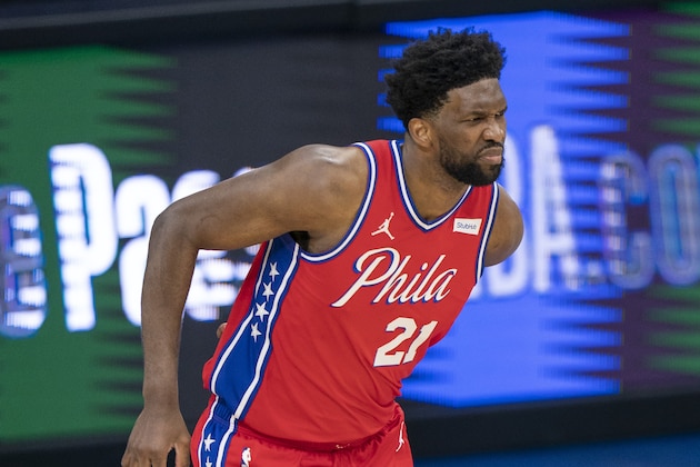 Philadelphia 76ers' Joel Embiid reacts after hitting the court during the second half of an NBA basketball game against the Boston Celtics, Friday, Jan. 22, 2021, in Philadelphia. (AP Photo/Chris Szagola)