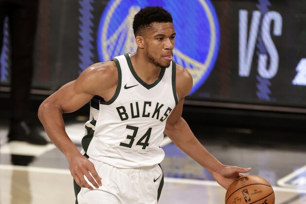 Milwaukee Bucks forward Giannis Antetokounmpo (34) in action during an NBA basketball game against the Brooklyn Nets, Monday, Jan. 18, 2021, in New York. The Nets won 123-125. (AP Photo/Adam Hunger)