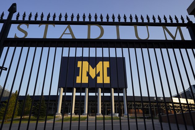 The University of Michigan football stadium is shown in Ann Arbor, Mich., Thursday, Aug. 13, 2020. A crumbling college football season took a massive hit Aug. 11, when the Big Ten and Pac-12, two historic and powerful conferences, succumbed to the COVID-19 pandemic and canceled their fall football seasons. (AP Photo/Paul Sancya)