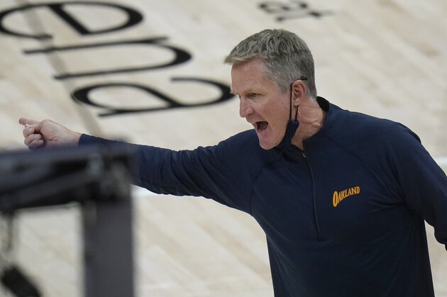 Golden State Warriors head coach Steve Kerr speaks with an official in the second half during an NBA basketball game against the Utah Jazz, Saturday, Jan. 23, 2021, in Salt Lake City. (AP Photo/Rick Bowmer)
